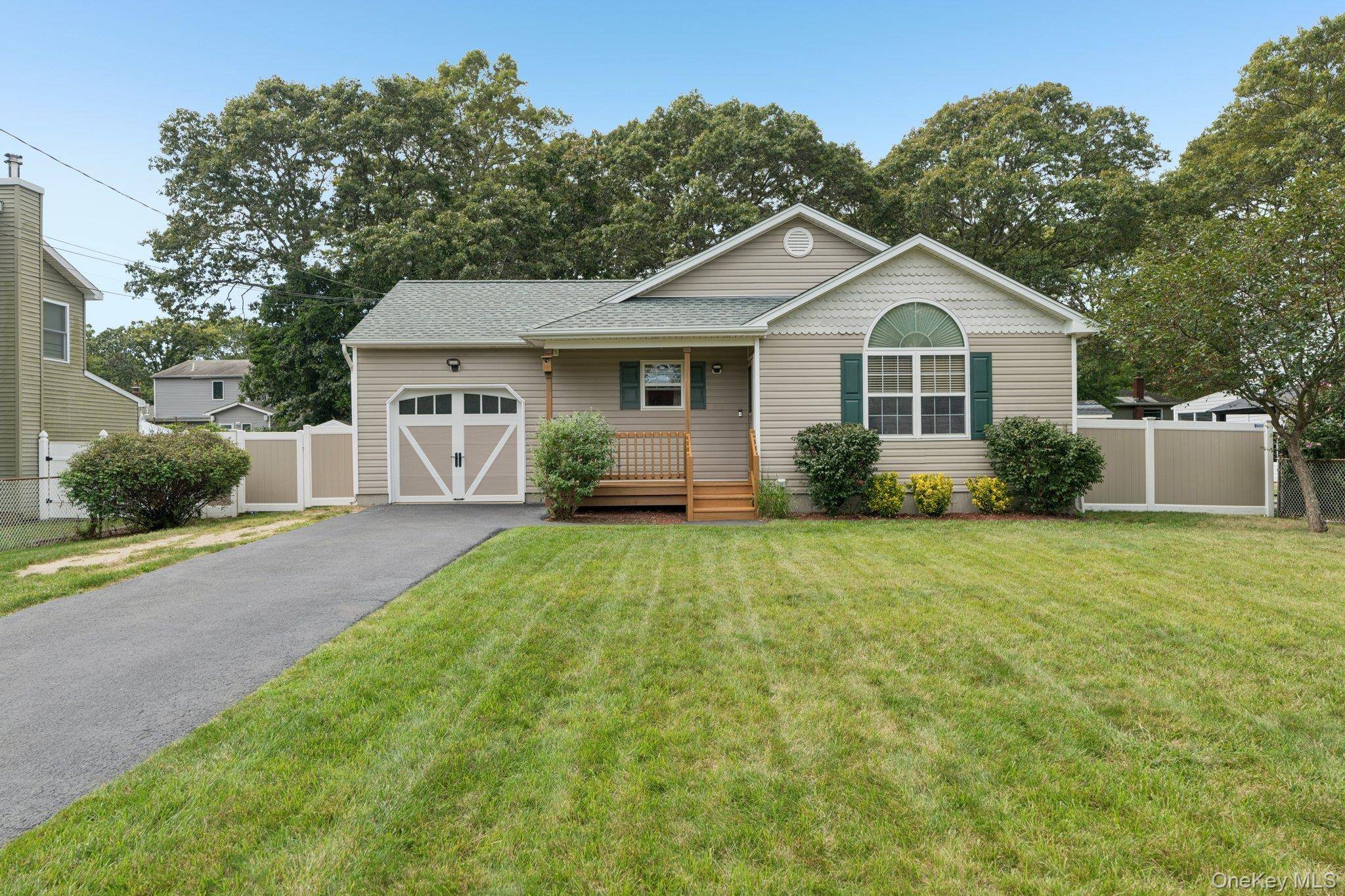 Welcome to this charming 3 bedroom, 2 bath ranch in Shirley, offering comfortable living with a spacious layout and desirable features.