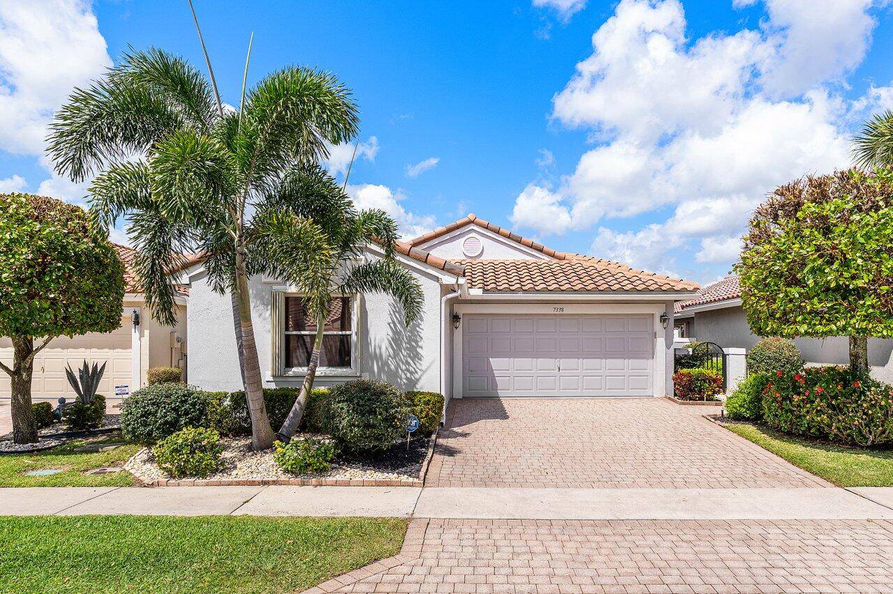 Beautiful home featuring a NEW ROOF only 3 years old, accordion shutters, gorgeous laminate flooring, vaulted ceilings, and a gorgeous updated eat in kitchen with a pantry.