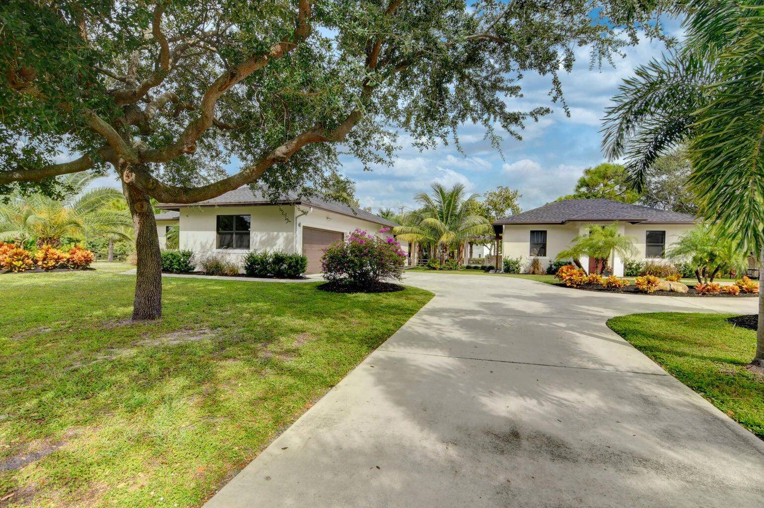 Experience fully furnished modern luxury in this 2018 built home nestled in a desirable no HOA neighborhood near I 95 and downtown West Palm Beach.