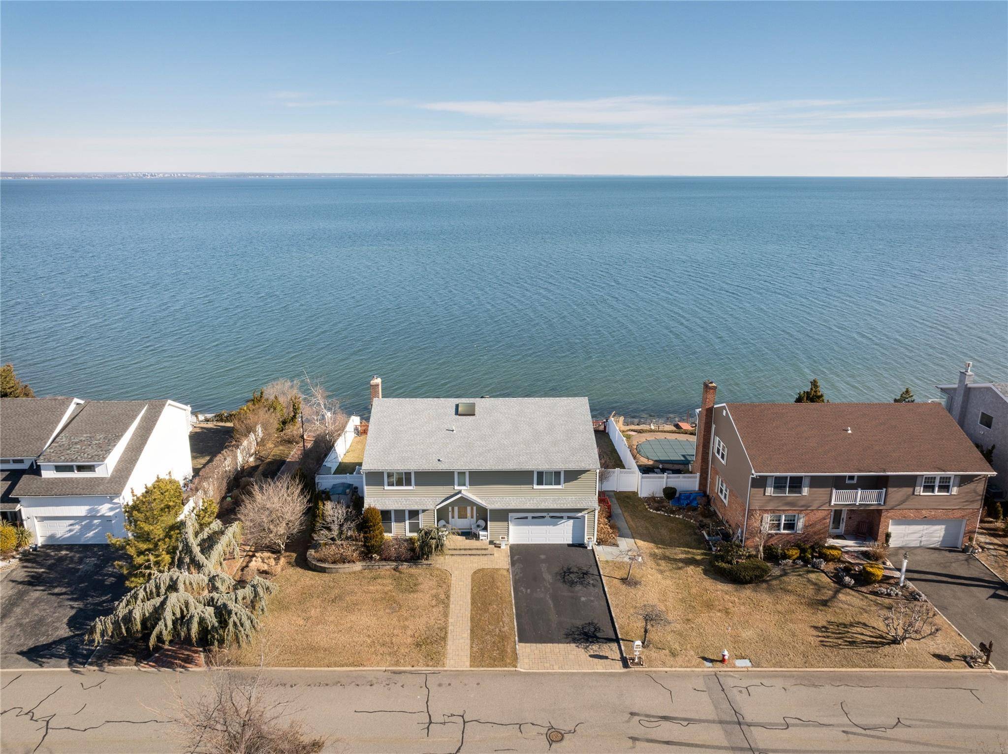 Welcome to this large colonial home, built in 1980, offering the perfect blend of modern amenities and timeless charm.