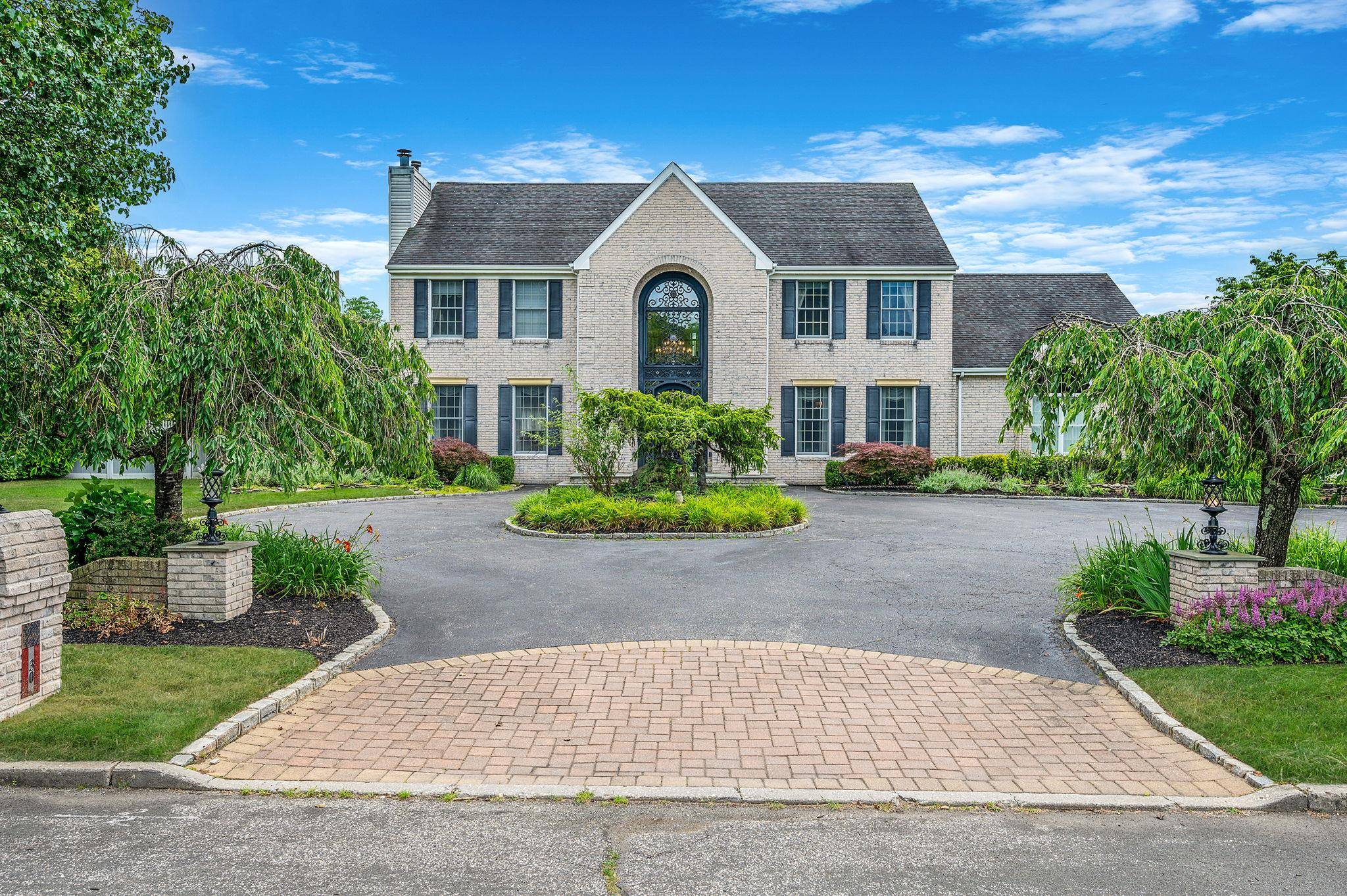 Welcome to 30 Miller Farms Drive a stunning post modern in the heart of Miller Place.