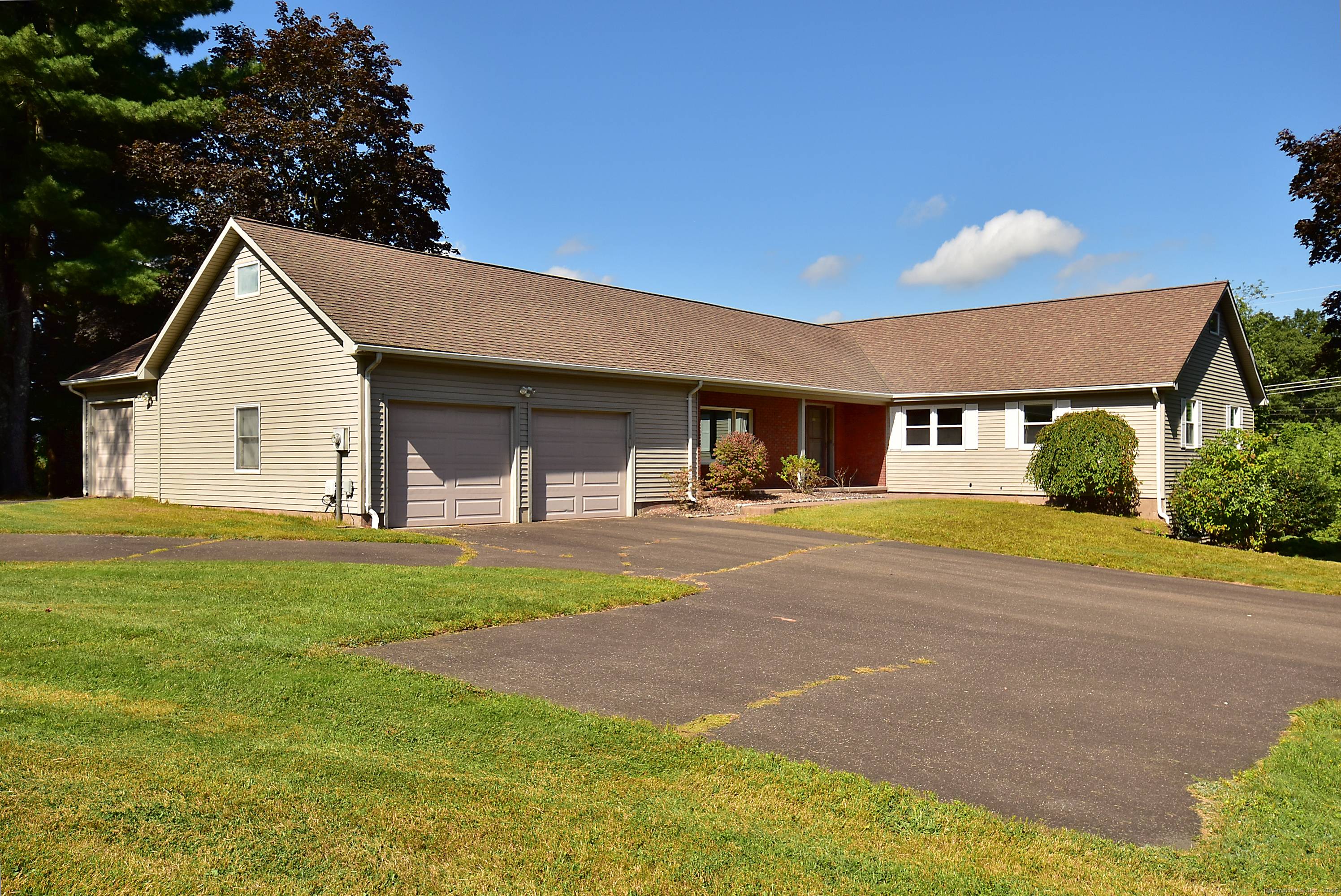 Welcome to this bright and sunny charming 9 room, 3 1 2 bath ranch with 3 car attached garage, set on a oversized 1.