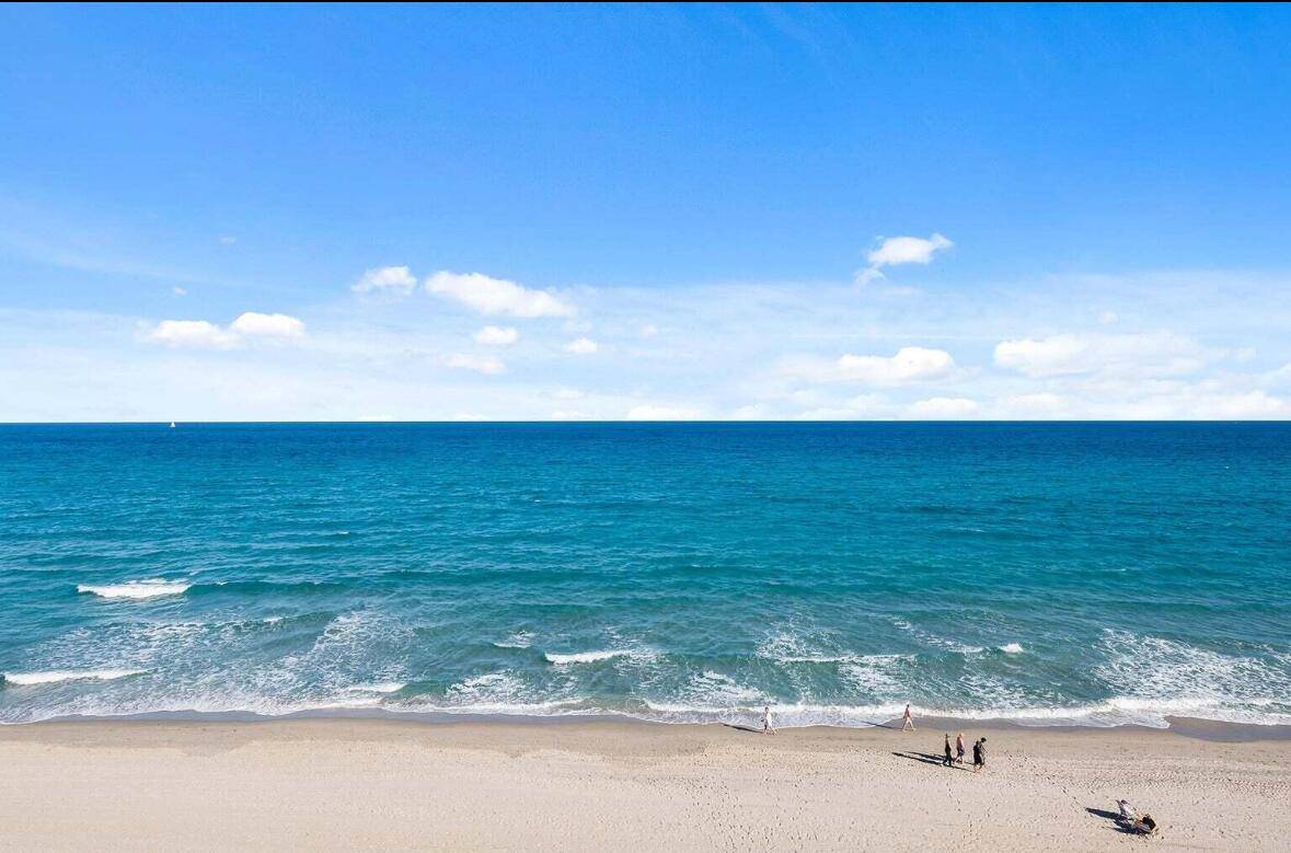 Endless direct ocean views from this thoughtfully renovated penthouse with a wrap around covered balcony.