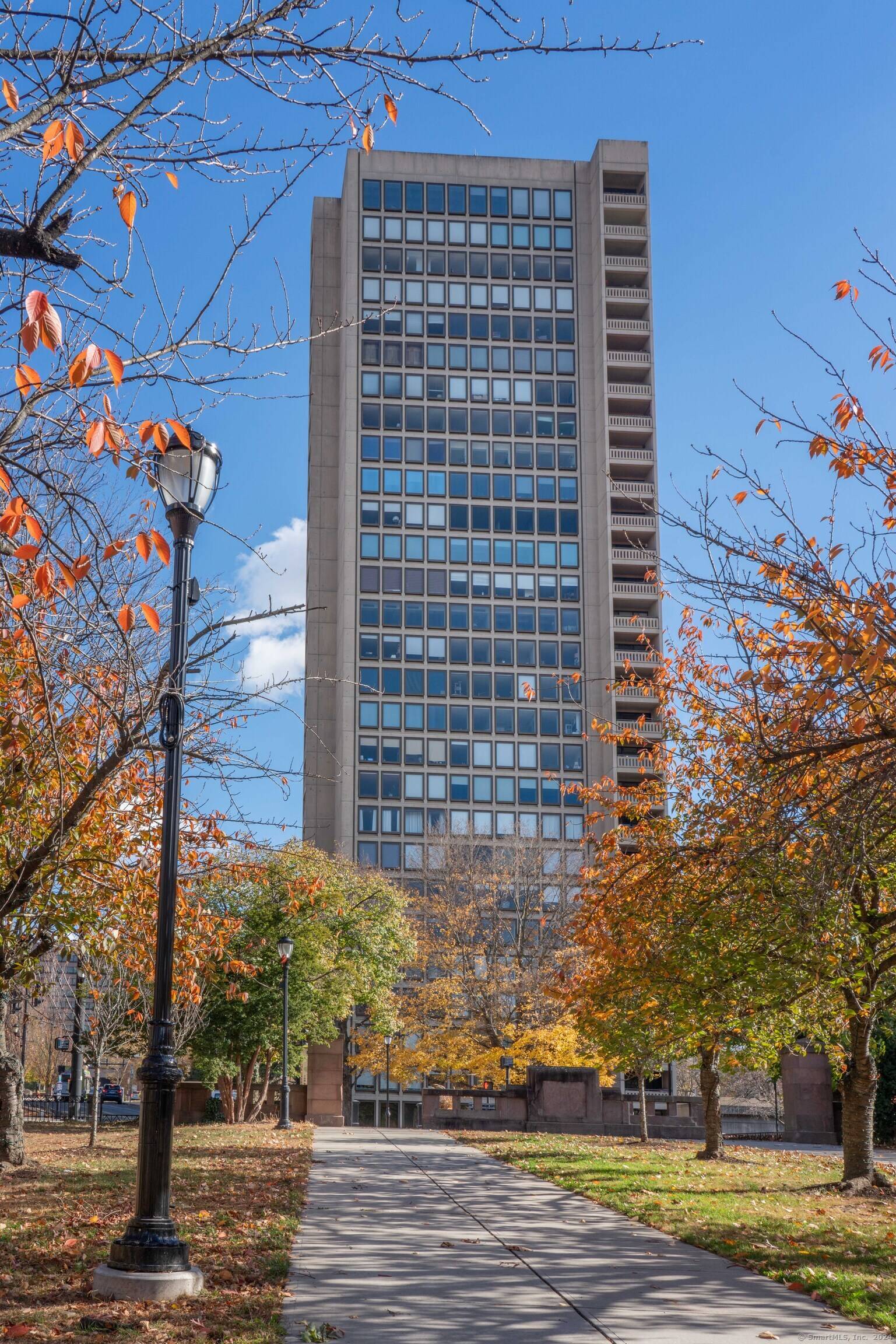 Experience the pinnacle of downtown living in this stunning 24th floor condo at the renowned Bushnell Tower, designed by architect I.