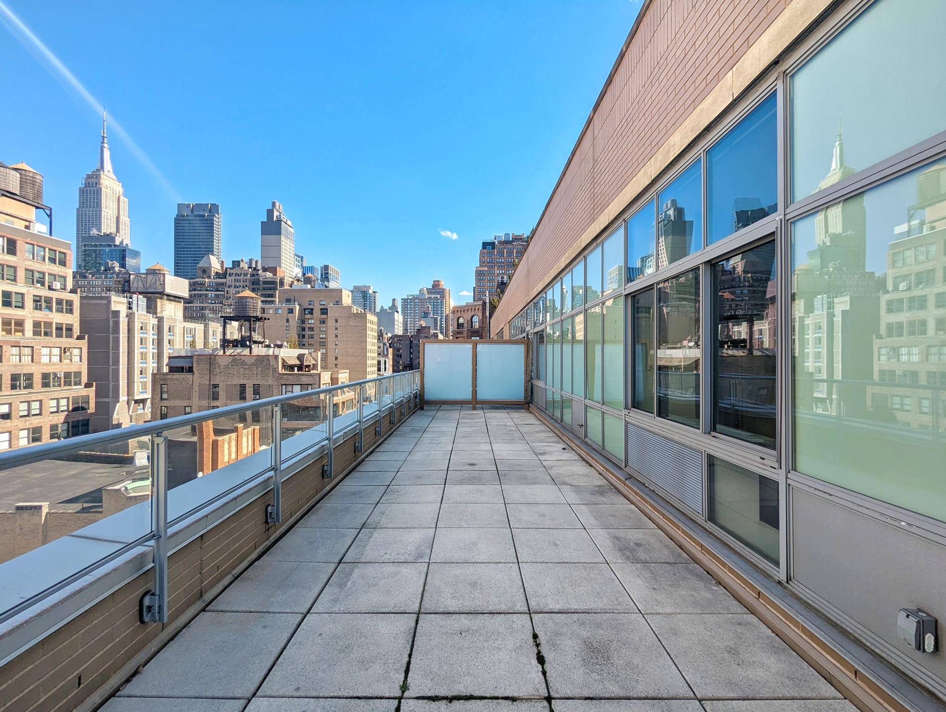 Sunny 1 Bed with MASSIVE PRIVATE TERRACE and views of the Empire State Building !