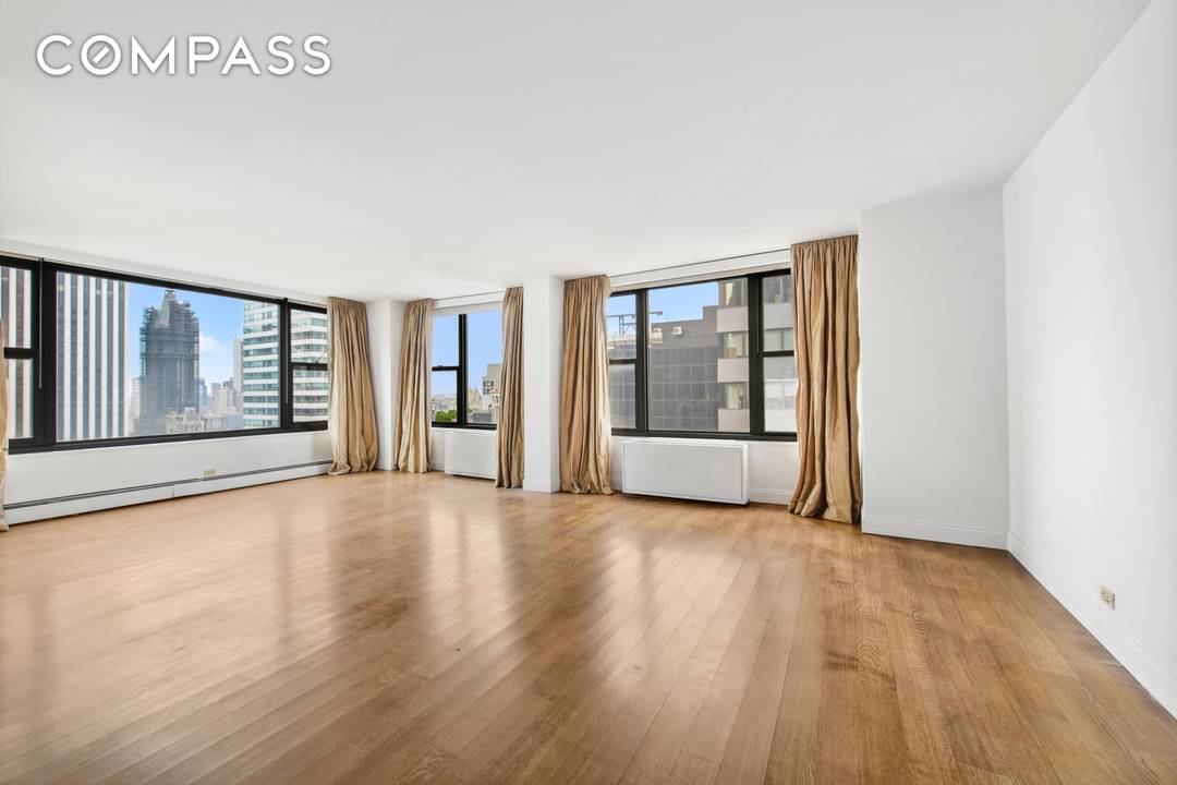 High Floor Condo.... Triple exposures, sun filled, beautifully renovated convertible 2 bedroom, 2 bathroom apartment on the 35th floor perfectly located in midtown.