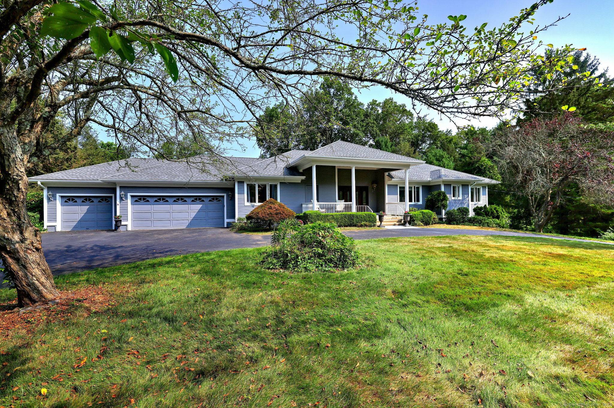 MEDITERRANEAN VILLA STYLE RANCH NESTLED ON QUIET CUL DE SAC THAT BORDERS ON THE BEAUTIFUL TRADITIONS PUBLIC GOLF CLUB AT OAK LANE.