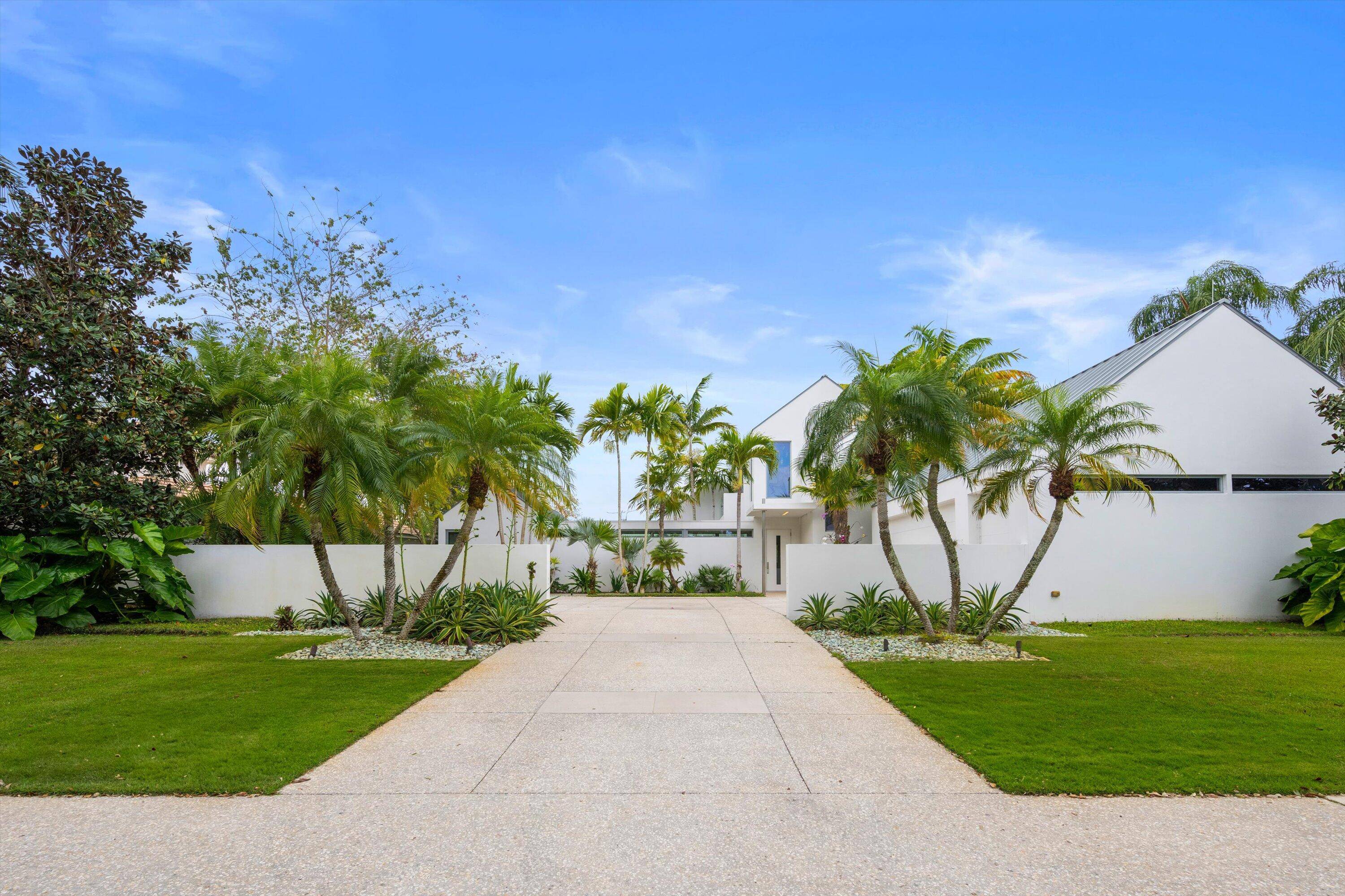 Custom built in 2014 and winner of the 2015 Design Award from the American Institute of Architects, Palm Beach Chapter, this stunning home is a masterpiece of modern design.