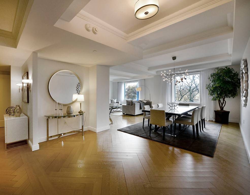 Gracious luxury living, beautiful Central Park views from living room and master bedroom and world class hotel services distinguish this mint condition, Costas Kondilys designed 3 bedroom, 3 bath apartment.