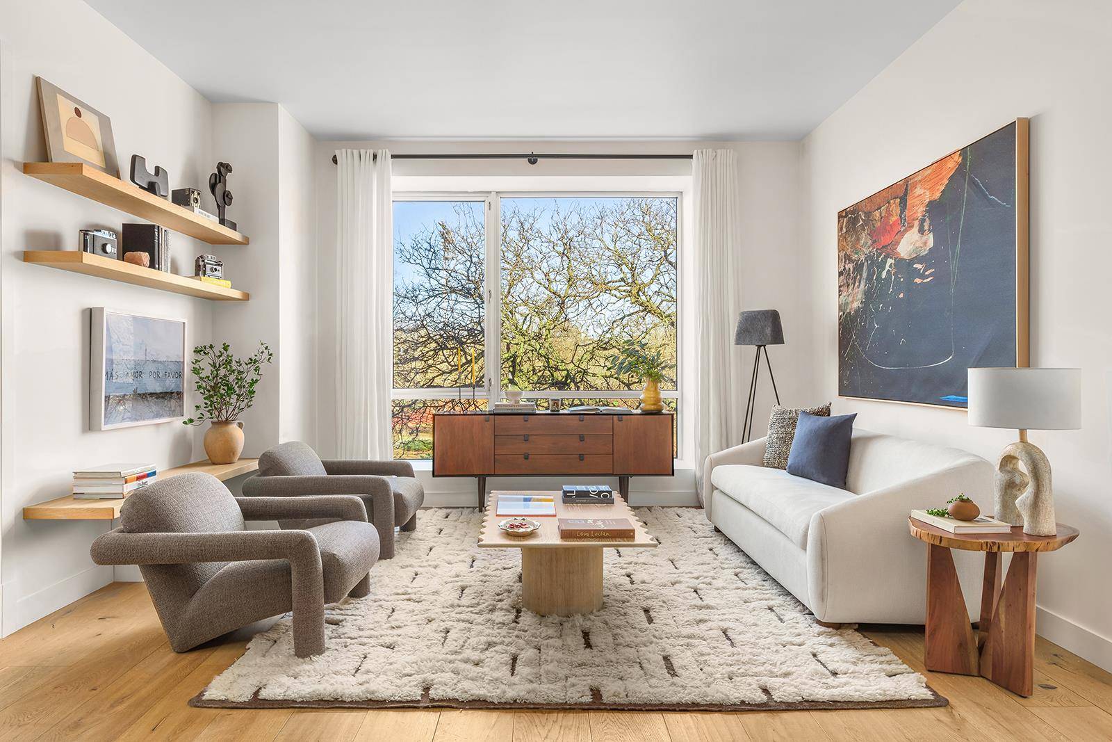 The Eklund Gomes Team at Elliman presents this perfect, chic, airy, RENOVATED 2 bedroom, 2 bathroom designer condo across the street from McCarren Park in Williamsburg !
