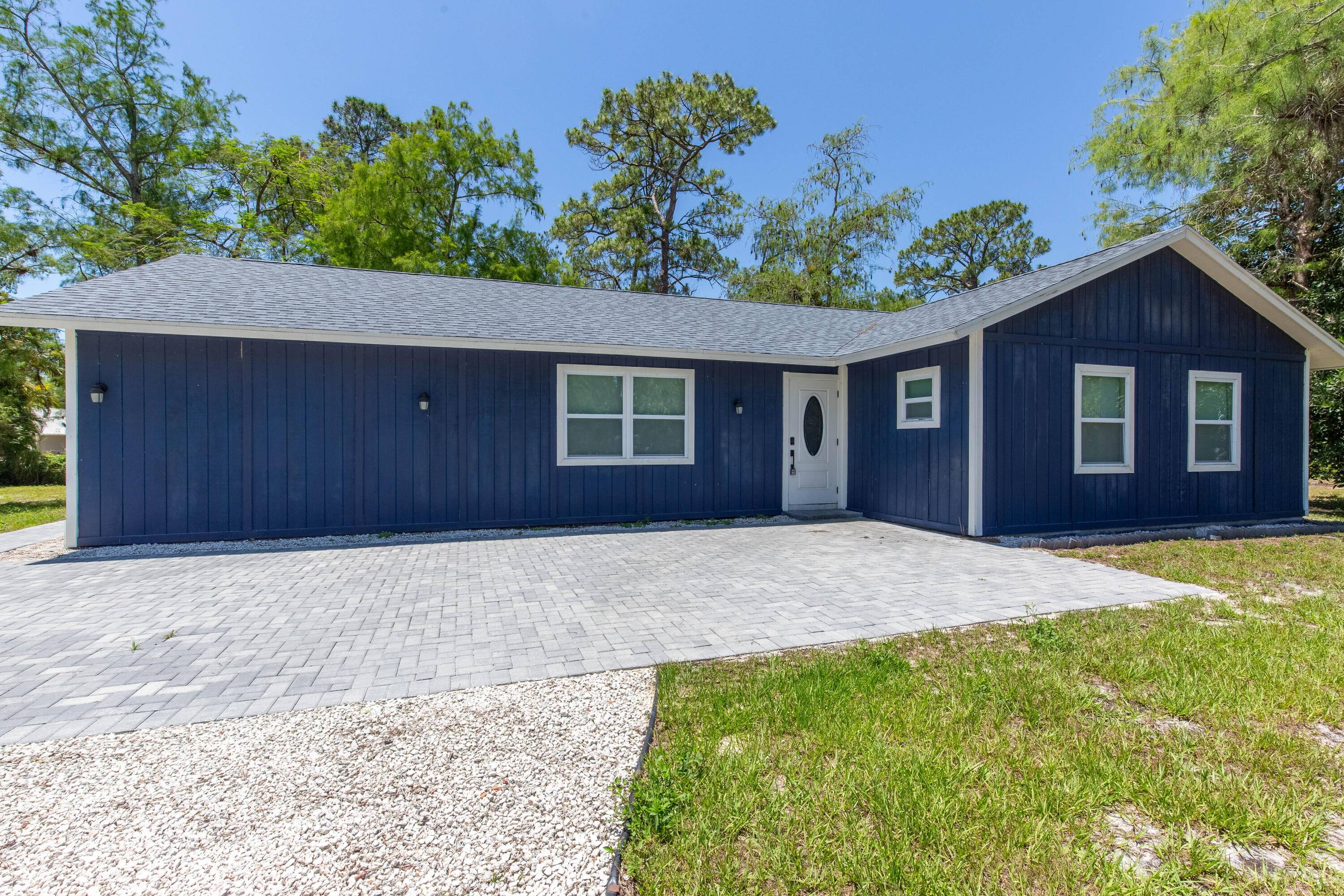 This completely remodeled three bedroom, two bath home sits on a 1.