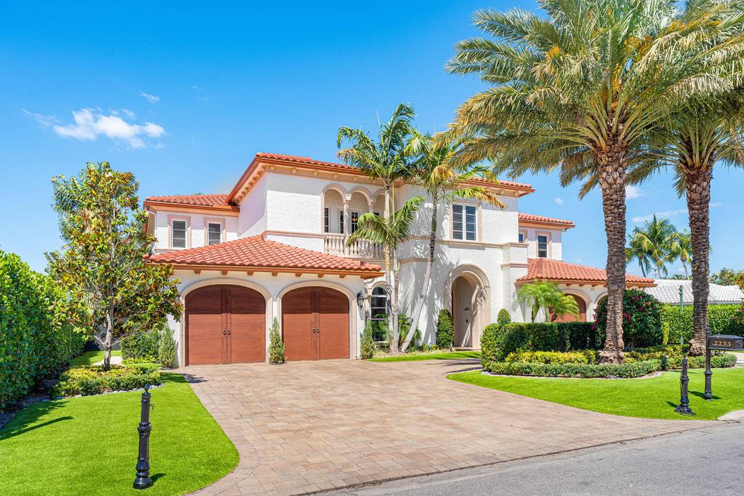This exceptional residence presents a rare blend of timeless Mizner architecture and modern luxury.
