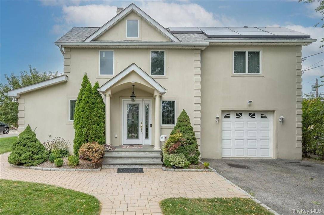Highly desirable Eastchester 5 bedroom Colonial that offers an open floor plan, Large renovated kitchen with granite tops, large family living room 16x23 with wood burning fireplace.