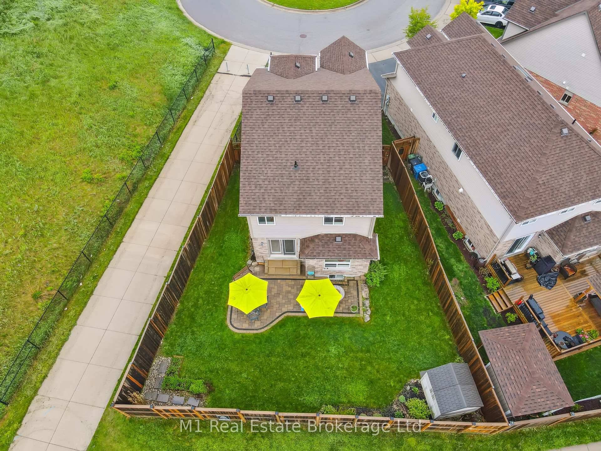 Welcome to this beautifully appointed 2 storey residence nestled in one of Guelphs most family friendly neighbourhoods that sits on a premium large pie shaped lot.