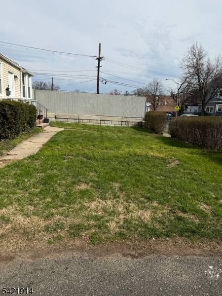 Large two family home with 7 bedrooms on a deep 62 x 200 lot.