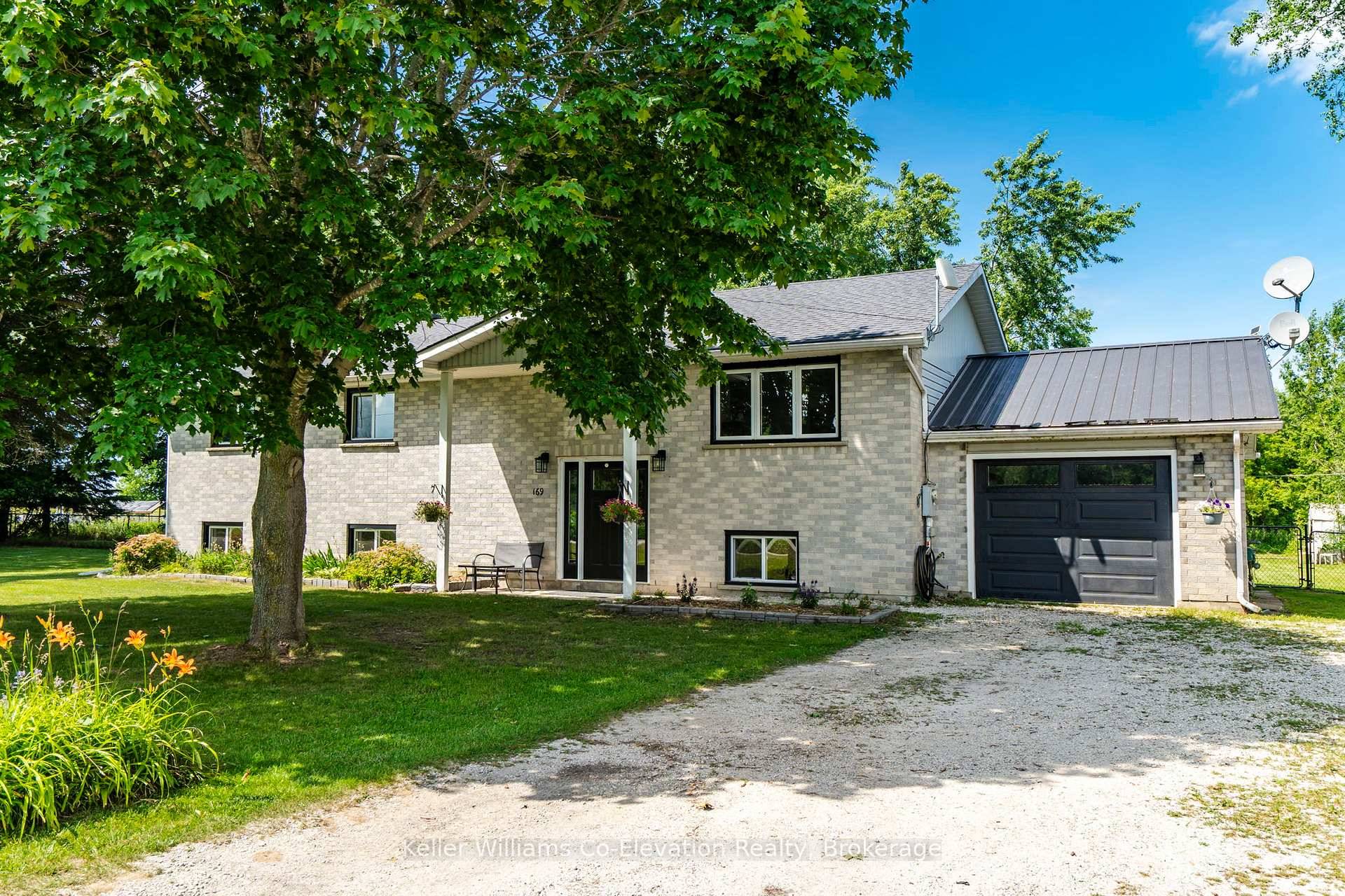 Welcome to 169 Switzer Street, a delightful raised bungalow nestled in the serene community of New Lowell.