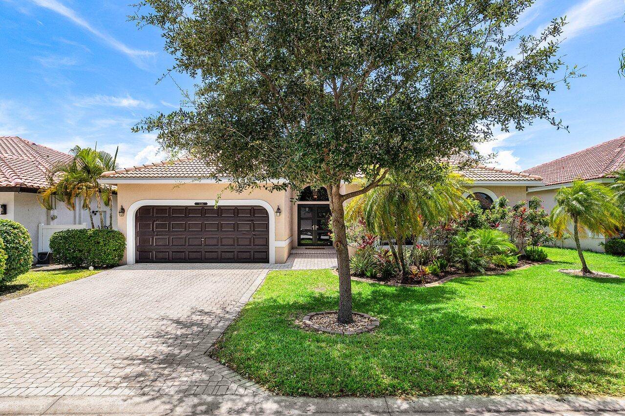Welcome to your next home, nestled in a quiet, tree filled Coral Springs neighborhood.
