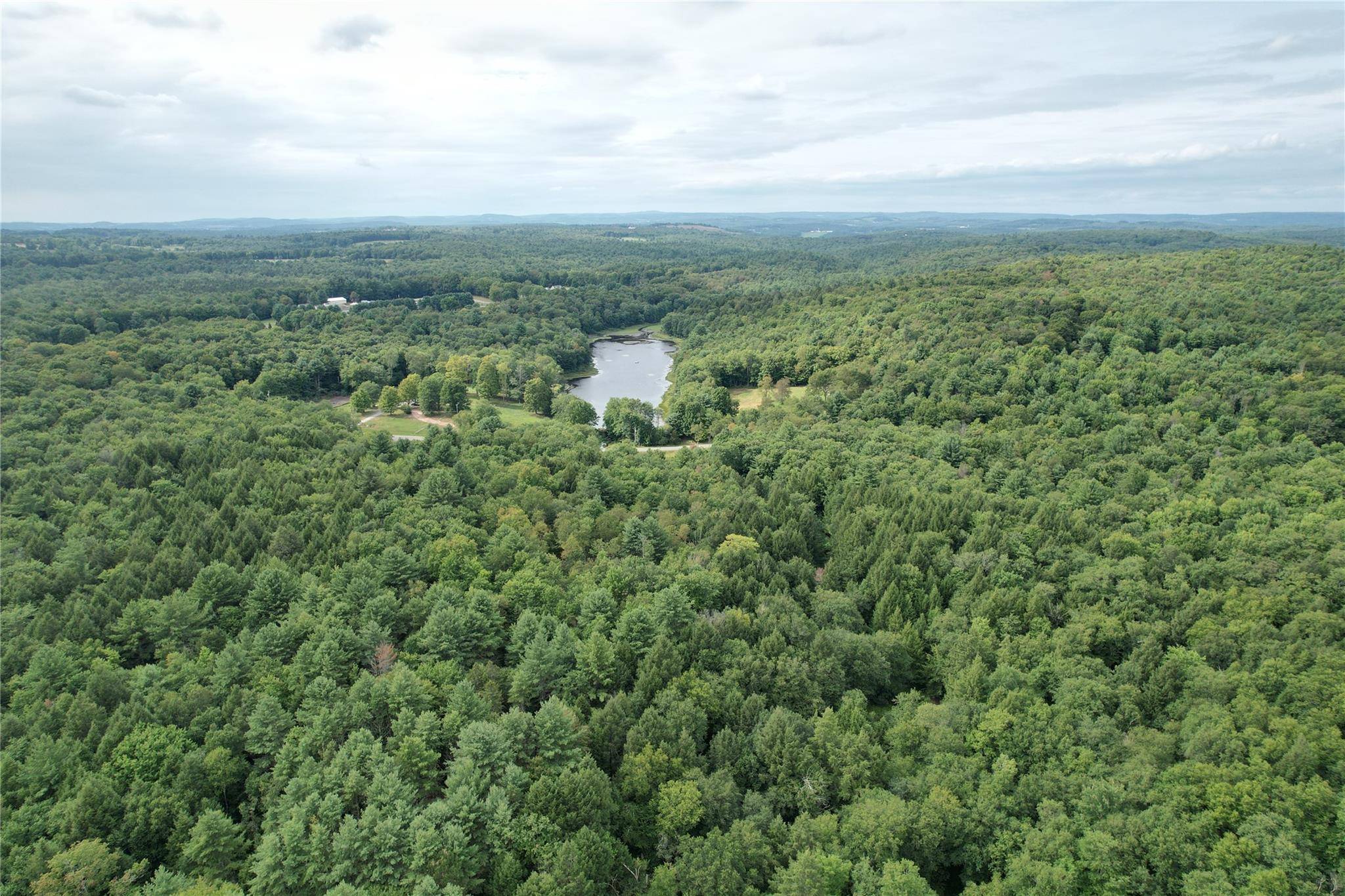 Exclusive Bethel Hideaway Welcome to John Bishop Road, where an amazing opportunity to purchase a spectacular 58 acre parcel awaits.