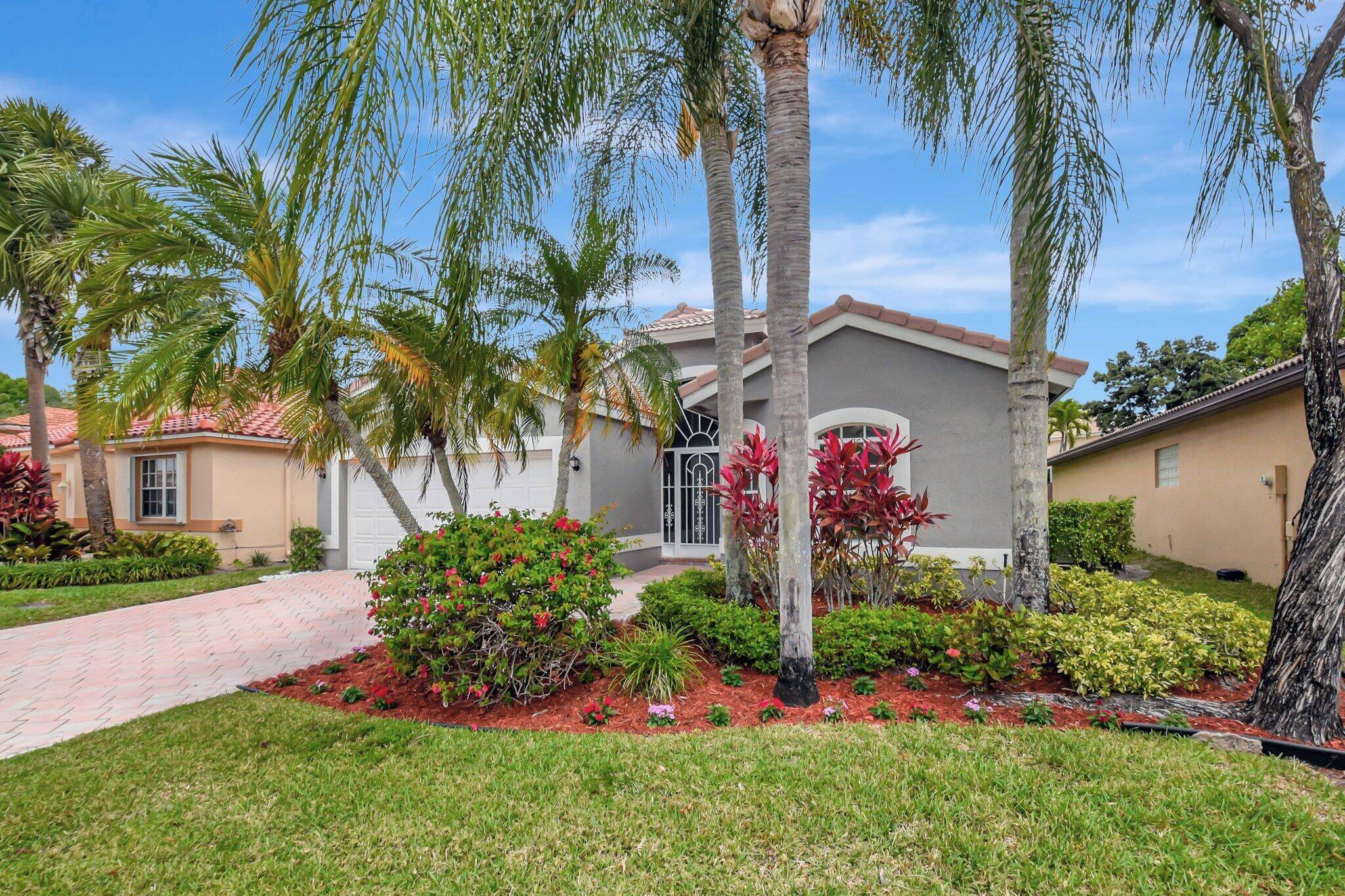 Step into this immaculately maintained 3 bedroom, 2 bath home featuring soaring vaulted ceilings and a spacious two car garage.