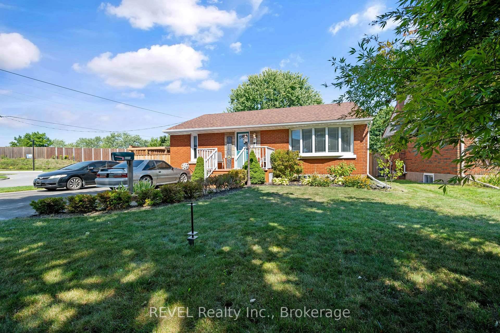 Exceptional 2 2 bedroom bungalow situated on a quiet street, offering a full in law suite with a separate entrance.
