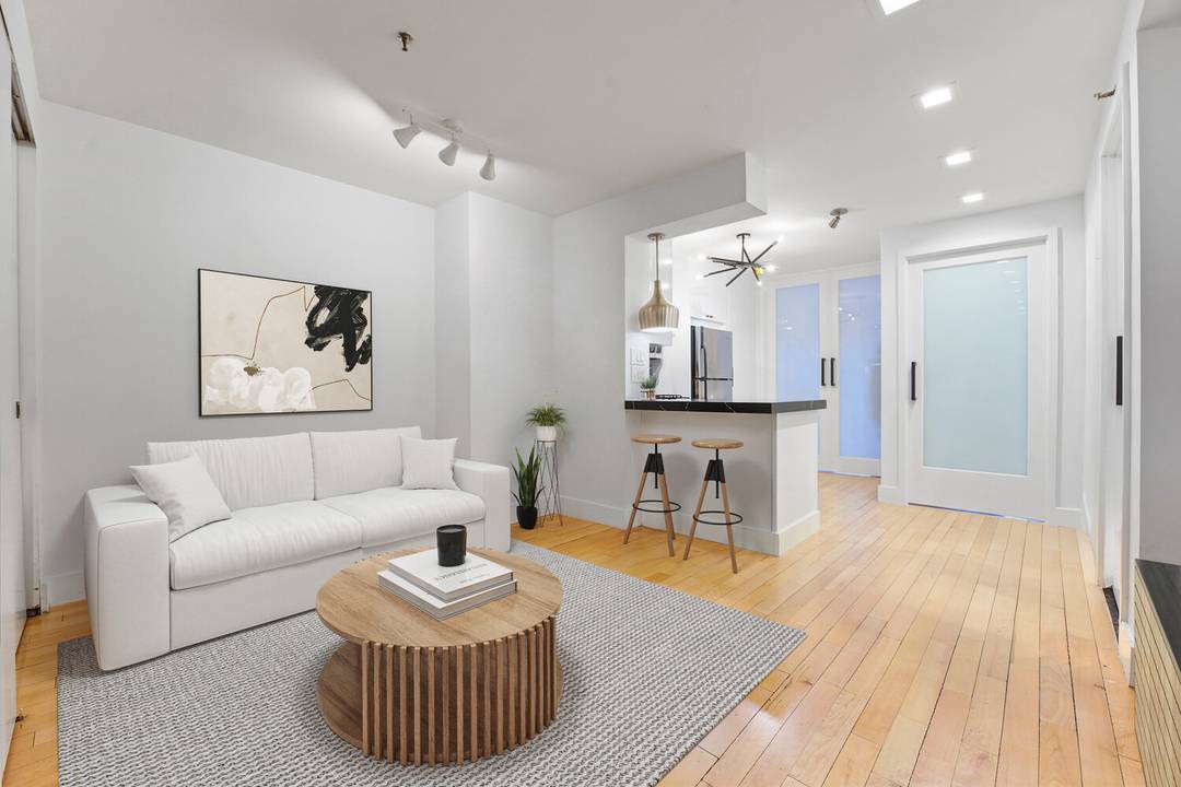 This sun filled, fully renovated two bedroom or 1 bedroom home office, two full bathroom condo is ideally situated in the heart of the East Village with views of Tompkins ...