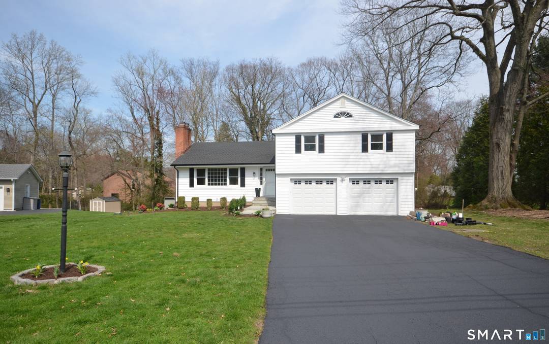 Welcome to 153 Woody Lane, an exceptional Split Style home nestled on a quiet cul de sac in Fairfield.