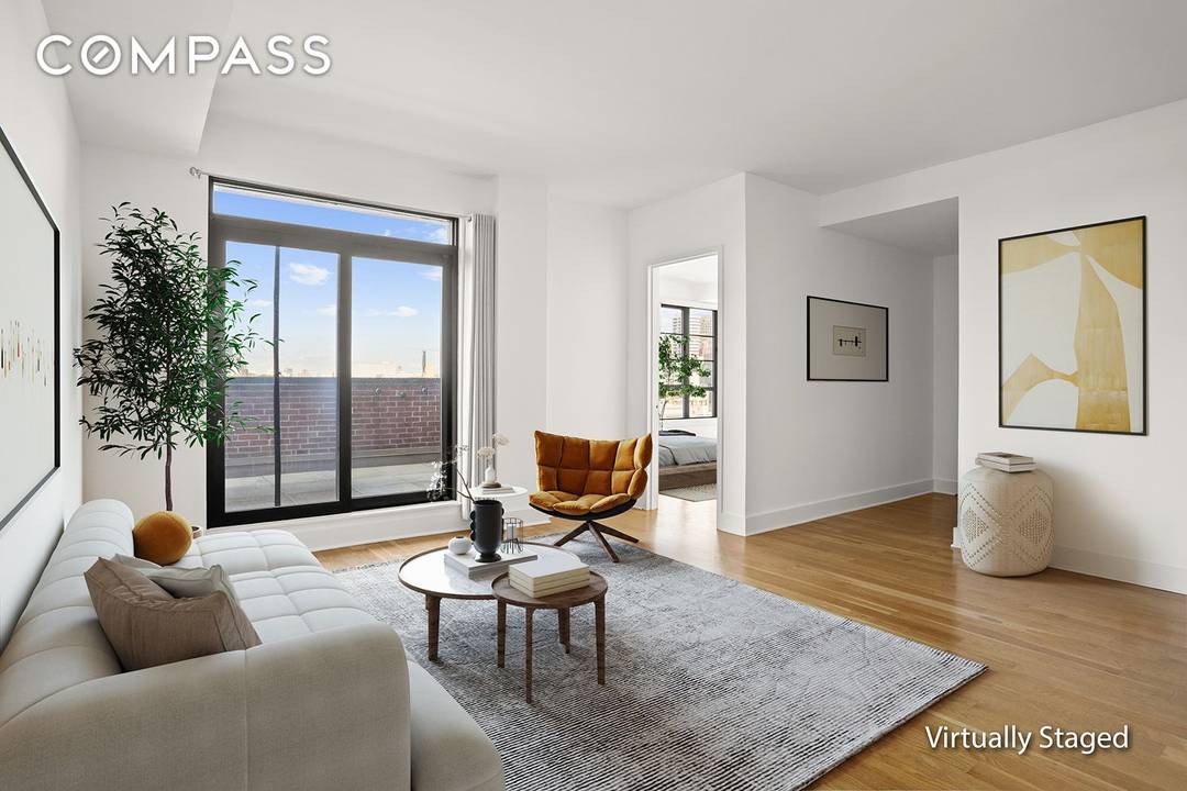 Welcome to Penthouse A at The Decker, a sun filled 2BR 2BA home with sweeping skyline and bridge views.