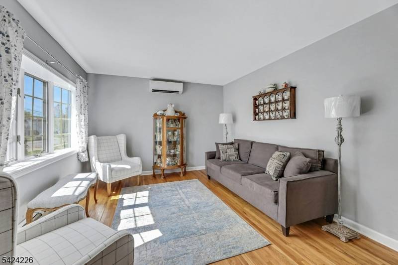 Don't judge a book by its cover this classic very well maintained 3BD, 3BA expanded Cape Cod located in the desirable Maple Valley Section of Clifton keeps its best surprise ...