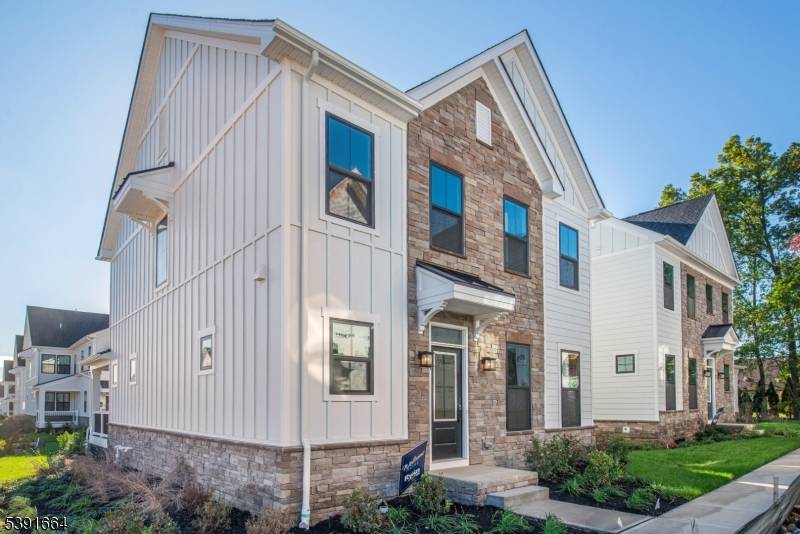 Experience luxury living in this brand new, never lived in end unit townhome !