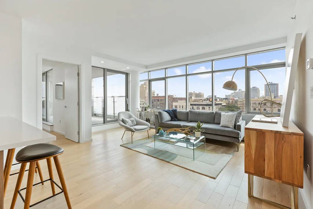 This gorgeous penthouse is a 2 bedroom 2 bathroom home featuring floor to ceiling, triple paned windows, private balcony and sweeping views of the Hudson River.