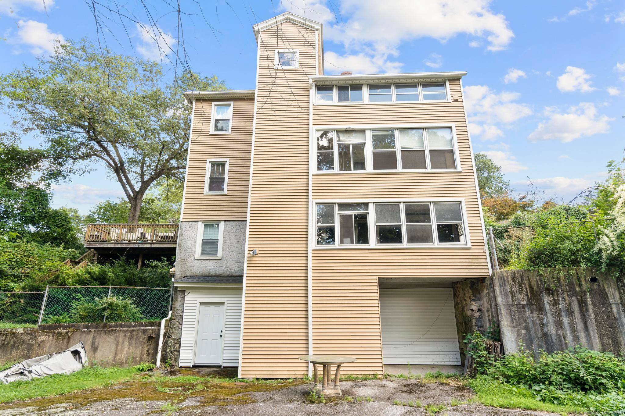 4 Unit Multi Family Property at 105 John Street, Naugatuck, CT Discover this exceptional investment opportunity !