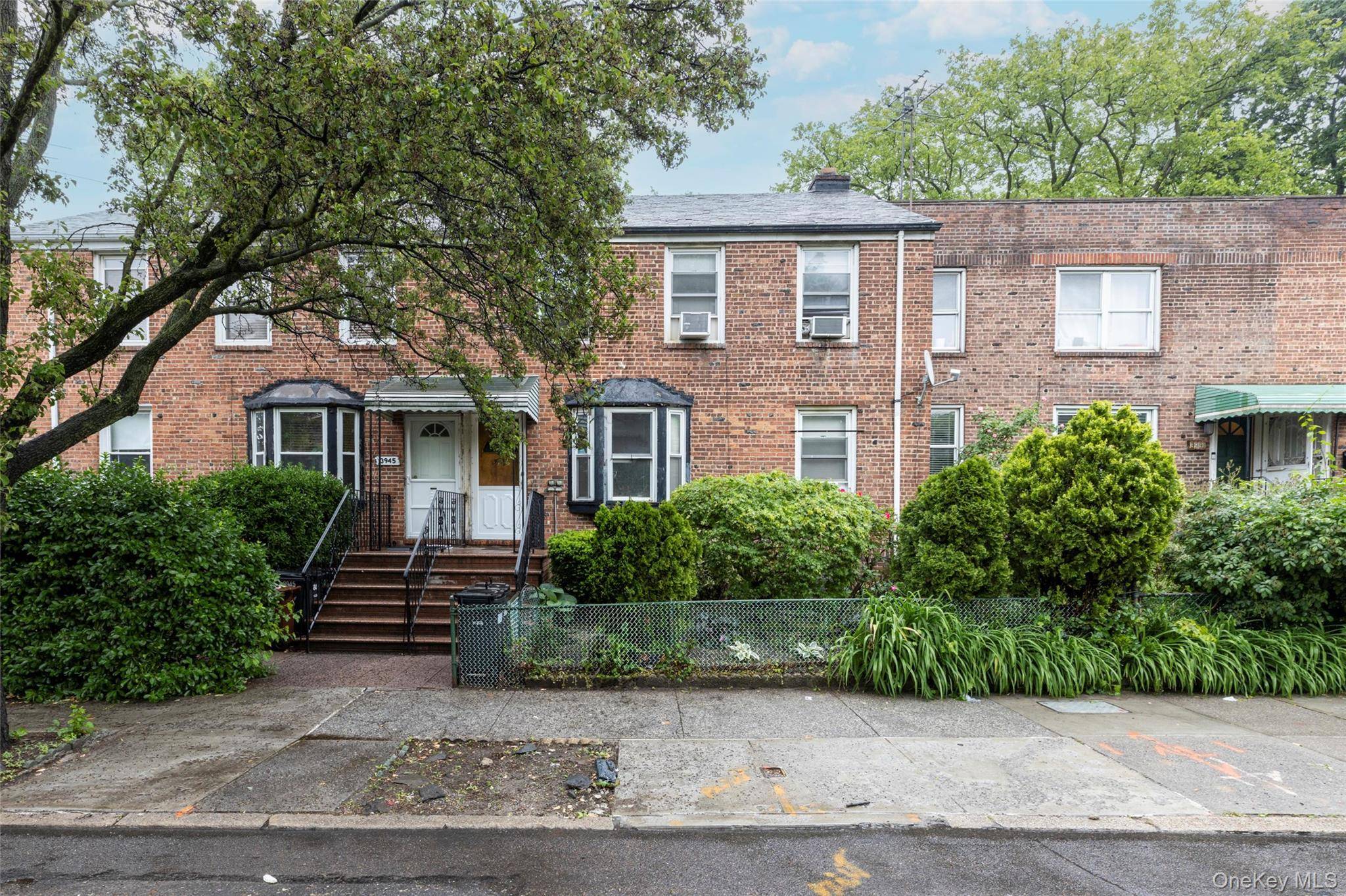 A PRICE TO BRAG ABOUT ! Welcome to this beautiful three level 5br 3bth Townhouse in the Historic Sunnyside Gardens neighborhood.