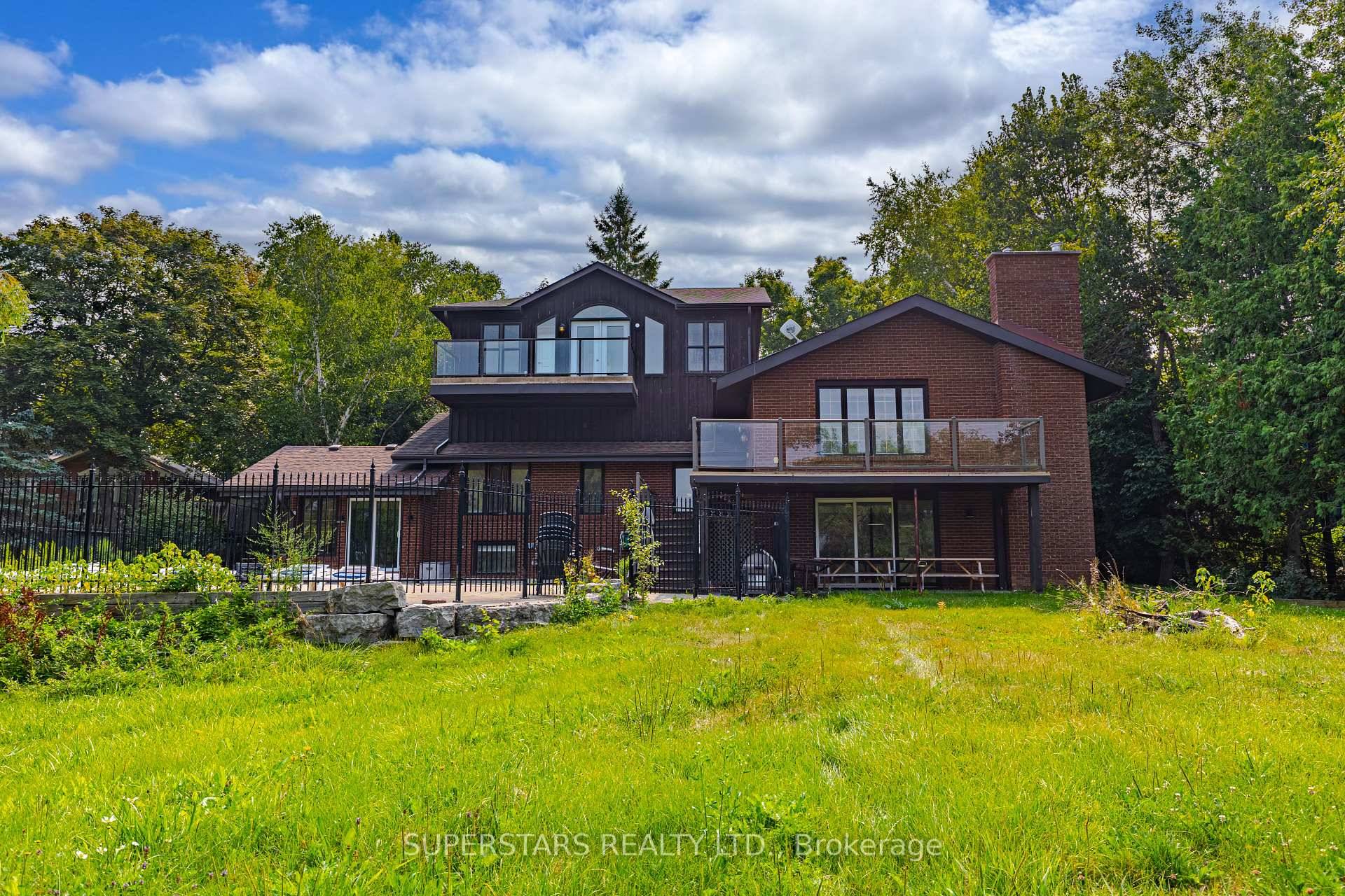 Escape to this truly special waterfront country cottage where charm, comfort, and natural beauty come together in perfect harmony.