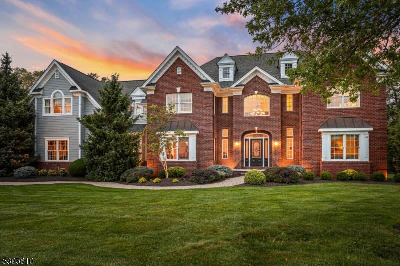 Welcome to this stunning 5 bedroom, 6 full and 2 half bath luxury estate designed for elegant living and effortless entertaining.