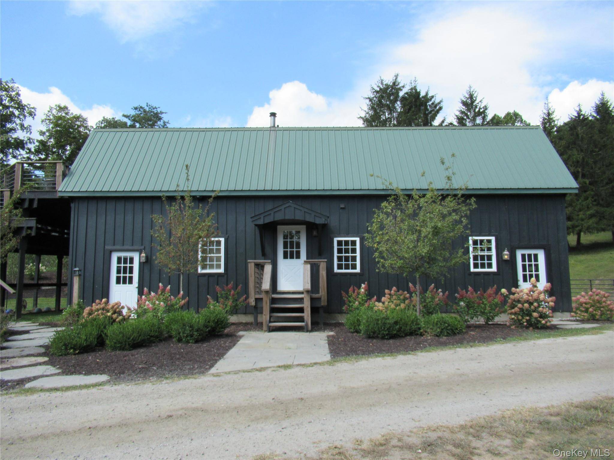 Barndominium Bliss ! Captivating views and the unique opportunity to live your best life on a 39 acre working horse farm.