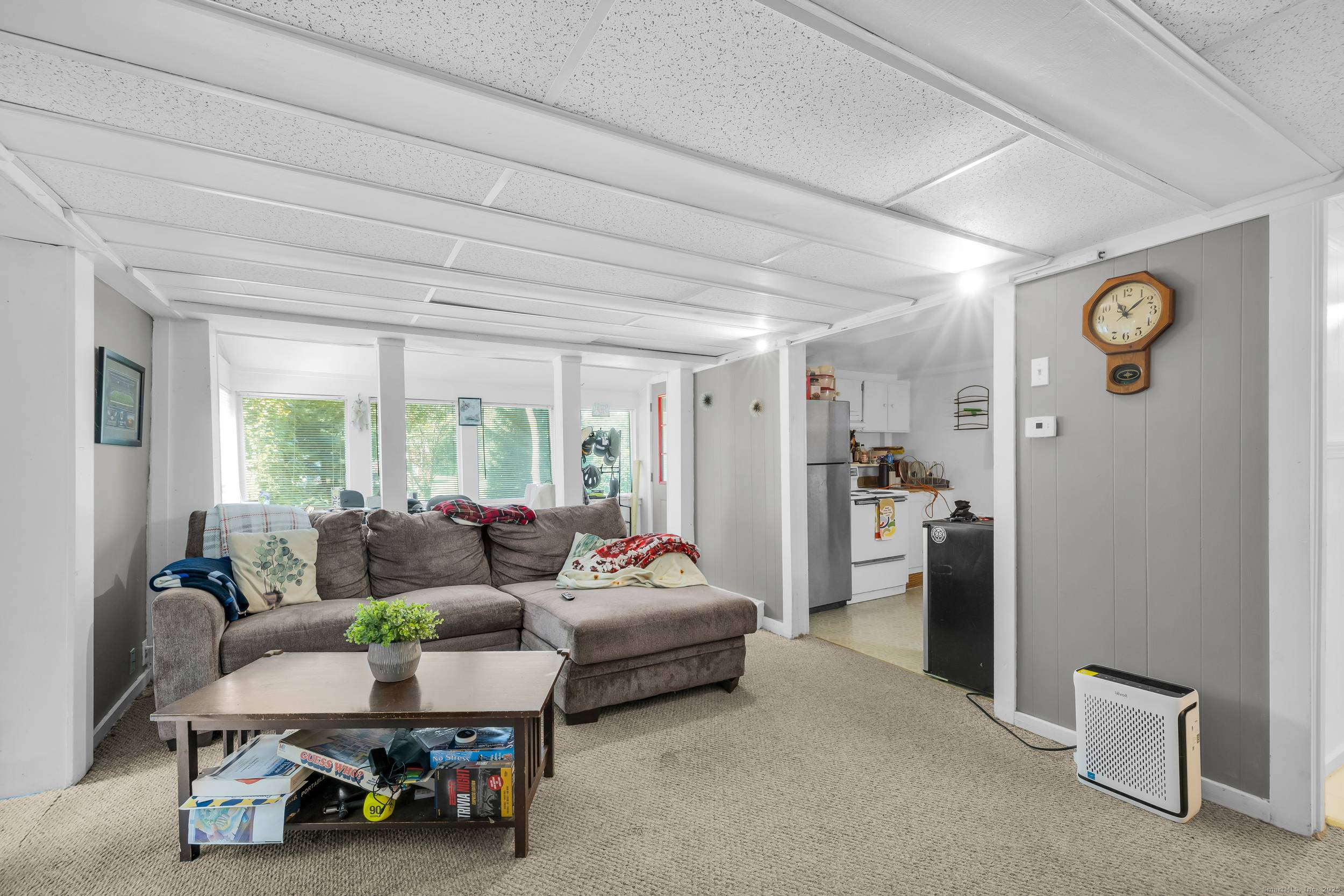 Set on a scenic lot in Woodbury, this property offers a rare combination of space, versatility, and untapped potential.