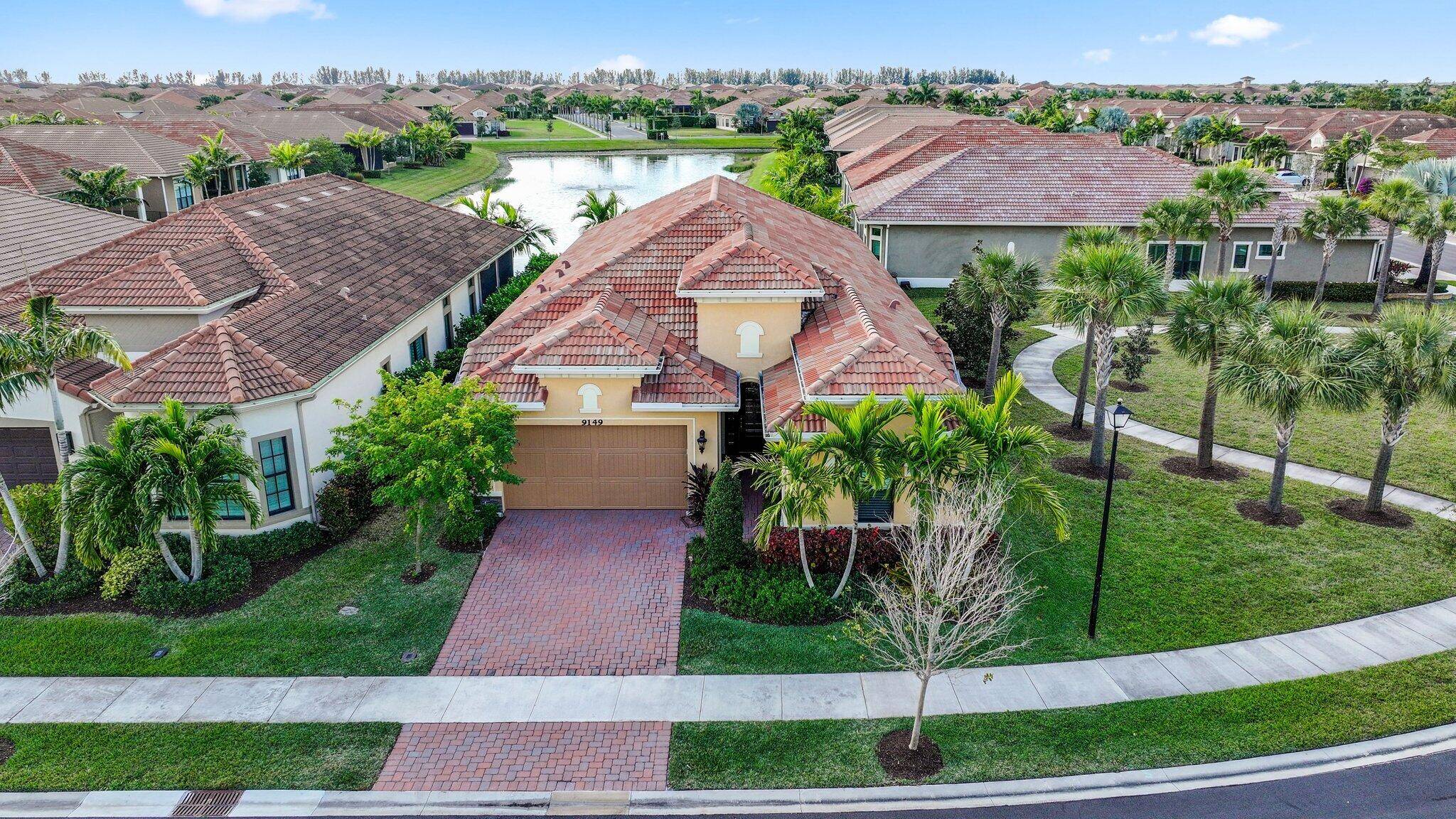 Discover the perfect blend of modern elegance and serene living at 9149 Leon Circle in Parkland, FL.