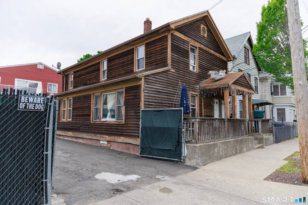 82 Fillmore St, 76 Fillmore St, and 86 Fillmore St are three connected properties sold as a package.