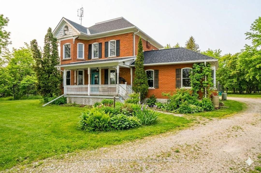 Set on a picturesque 30 acre parcel just minutes from Perth, this classic red brick farmhouse offers the perfect blend of rural charm and modern flexibility.