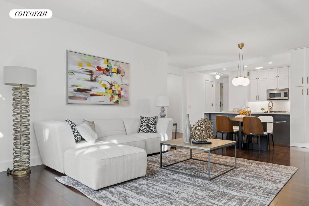 Immaculate high floor corner two bedroom, two bathroom residence in one of Midtown East's most desirable condominium buildings !