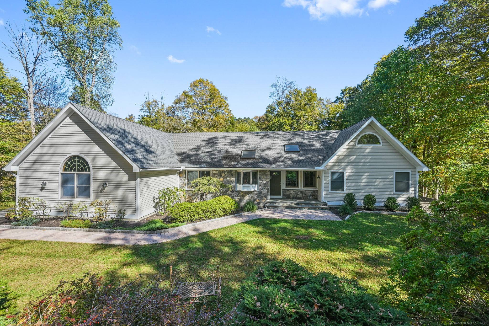 This spectacular custom built Contemporary Ranch style home is located in the Sail Harbour Club, a prestigious and private resort like Candlewood Lake community.