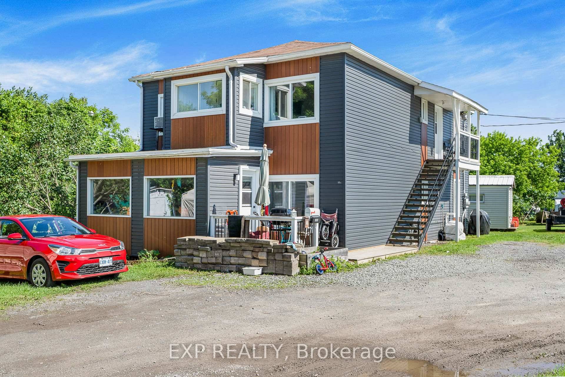 Charming Updated Duplex on Expansive Lot Near Hawkesbury Discover this beautifully updated duplex, ideally situated just outside Hawkesbury on a spacious lot just under an acre.