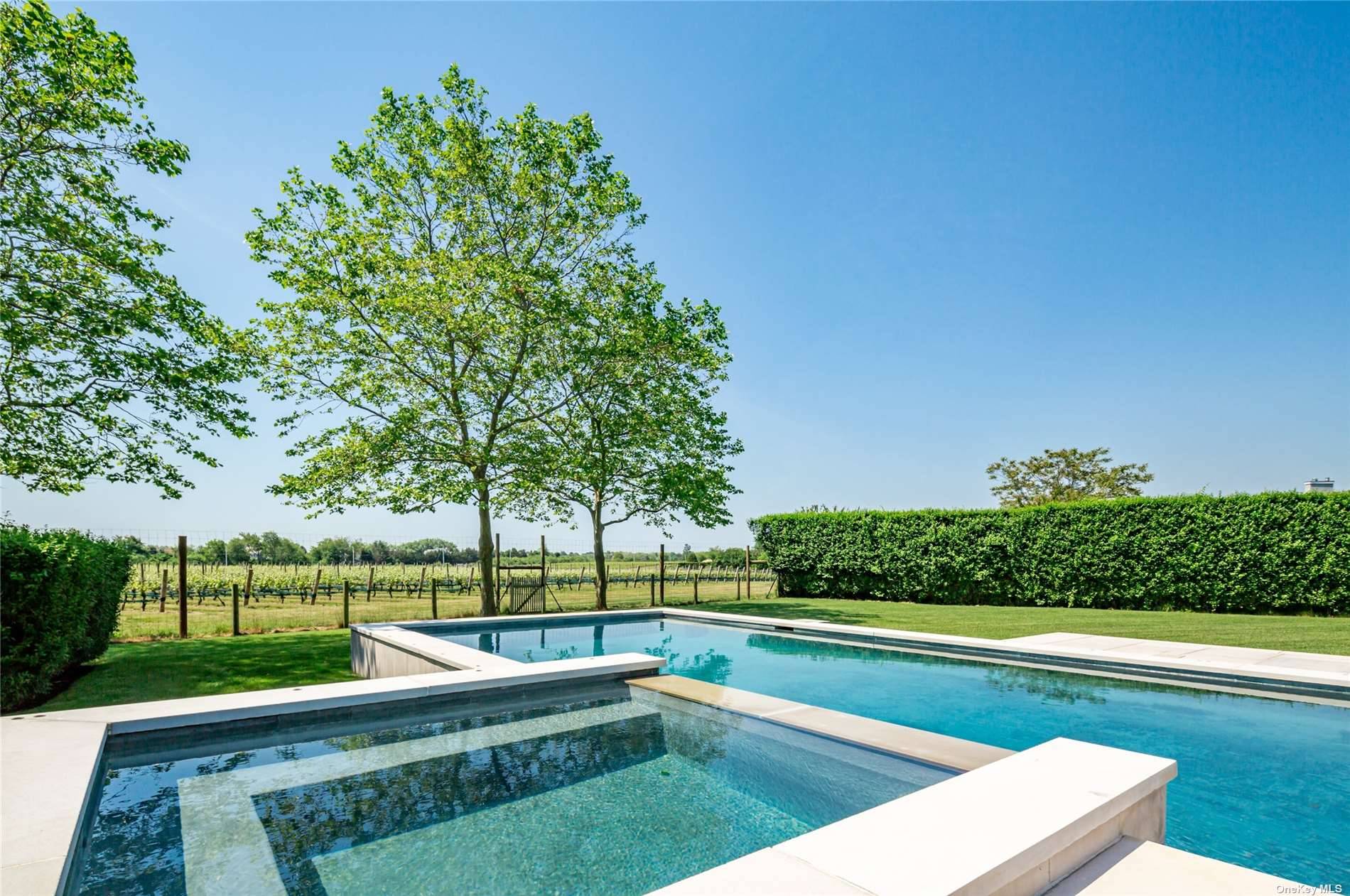 SPECTACULAR VINEYARD SETTING Private and serene setting on a cul de sac backing directly onto a wine vineyard offers 4 bedrooms and 2.