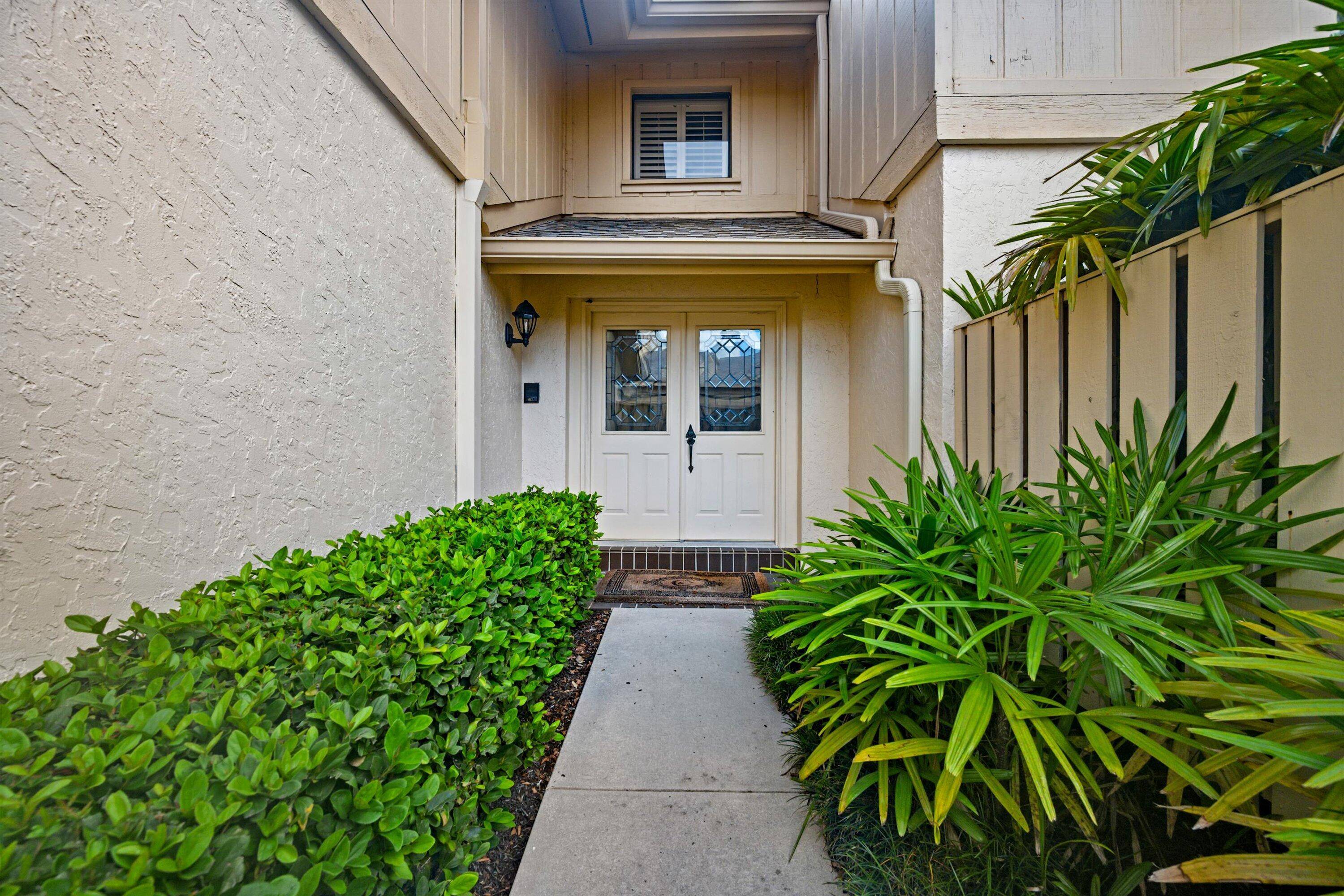 Spend the season in Waterbend at Jonathan's Landing with serene golf course views from a bright, vaulted ceiling 2 bedroom den the den functions perfectly as a third bedroom.