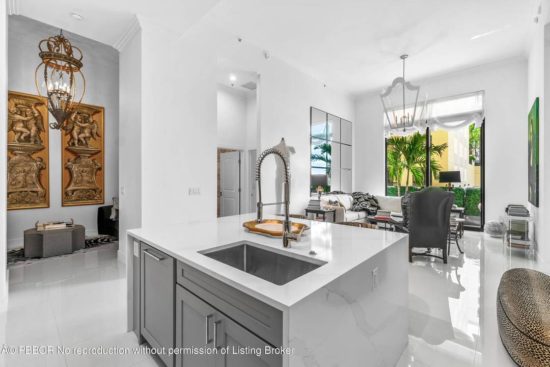 In the heart of downtown West Palm Beach, you'll find a stunning fully renovated condo that exudes modern luxury.