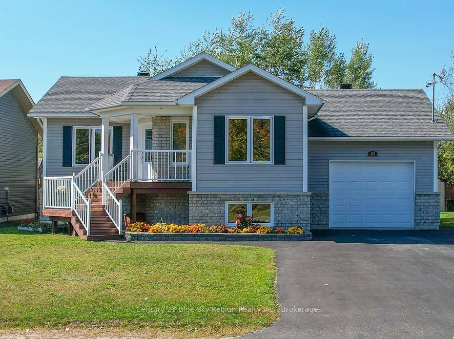 Welcome to this charming home featuring a beautifully manicured yard, an attached one car garage, and a lovely deck off the dining room perfect for outdoor dining and relaxation.