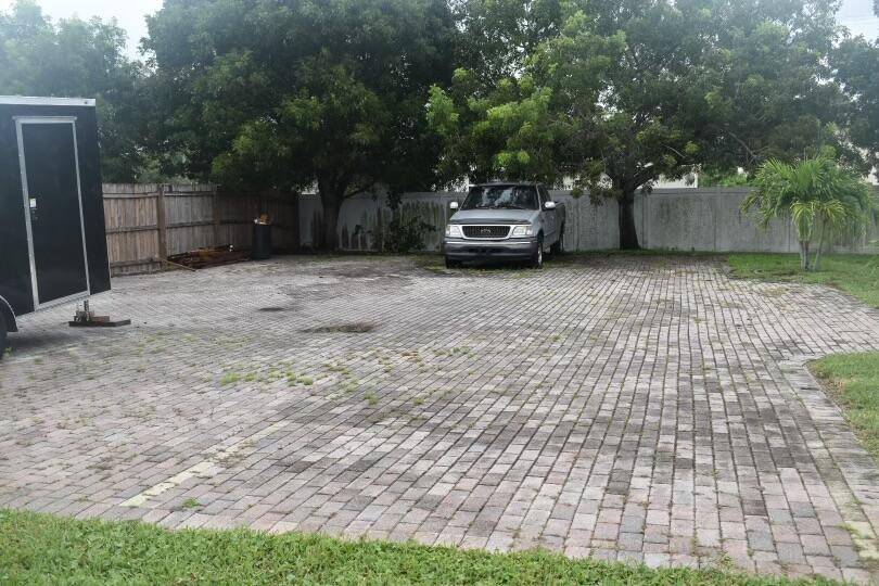 Welcome to this nice cleared, paved and fenced spacious lot of 0.