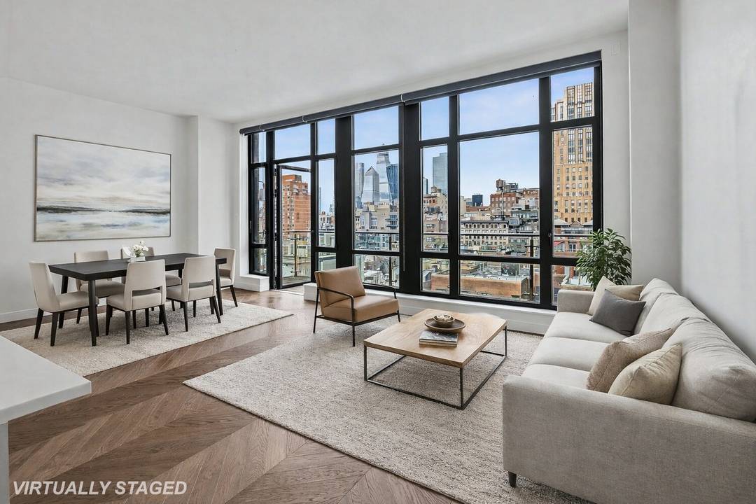 This 1402 square foot two bedroom, two bath plus powder room is bathed in northern light from dramatic oversized divided light windows.