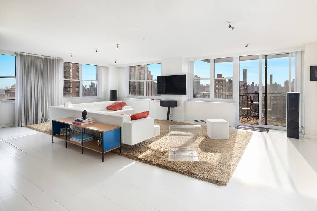 Stunning 2, 364 Square Foot Condo Loft, perched high above the Upper East Side with Unobstructed Views to the South, West and East.