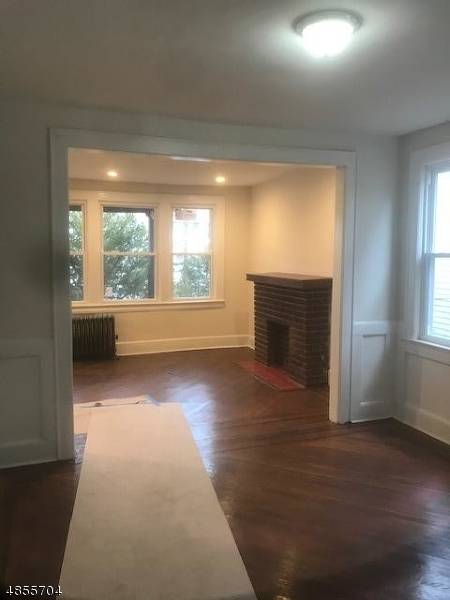 Beautifully renovated, with original character, 3 Unit home with green card, Separate front and rear entrances to all apartments.